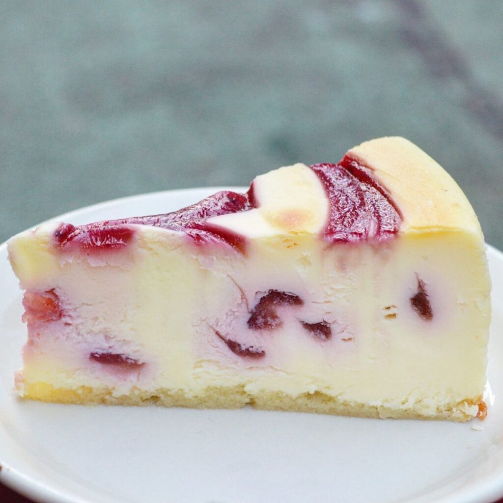 Bakeries That Deliver Cheesecake To Any Doorstep -  juniors raspberry swirl cheesecake