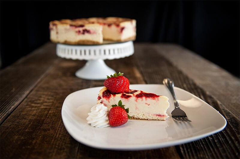 Bakeries That Deliver Cheesecake To Any Doorstep - high society cheesecake - chocolate strawberry cheeescake